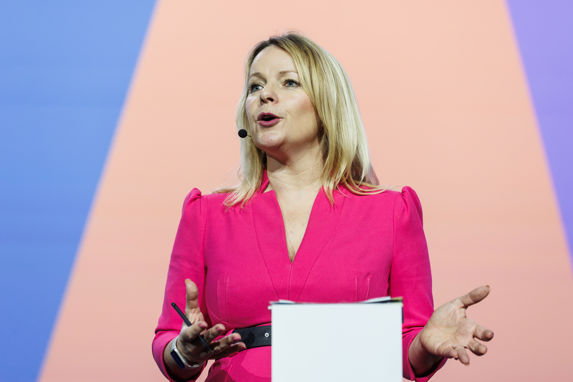 Moderator Susannah Streeter wearing pink. 